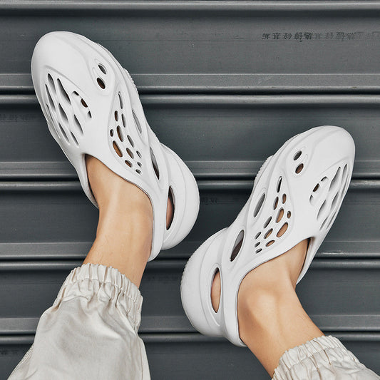 Anti-slip beach shoes worn over top of coconut-hole slippers