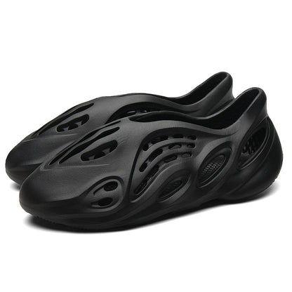 Anti-slip beach shoes worn over top of coconut-hole slippers