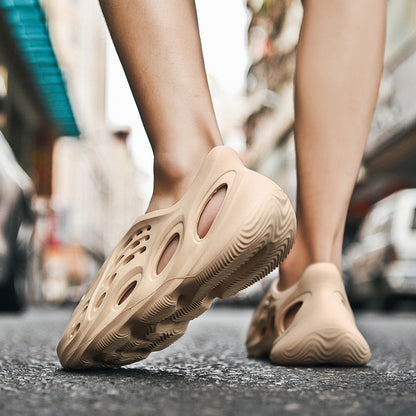 Anti-slip beach shoes worn over top of coconut-hole slippers
