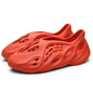 Anti-slip beach shoes worn over top of coconut-hole slippers
